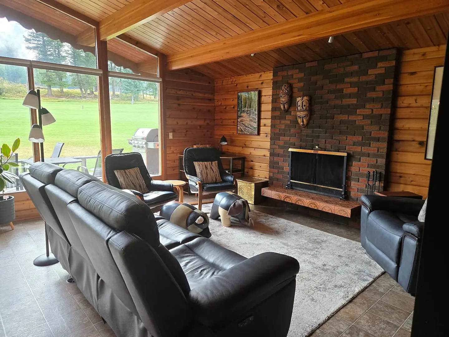 Living room with wood-burning fireplace